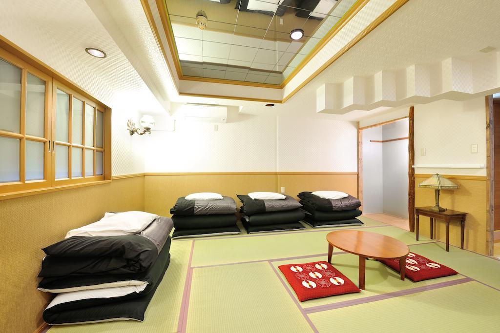 Khaosan World Asakusa Ryokan Токио Стая снимка